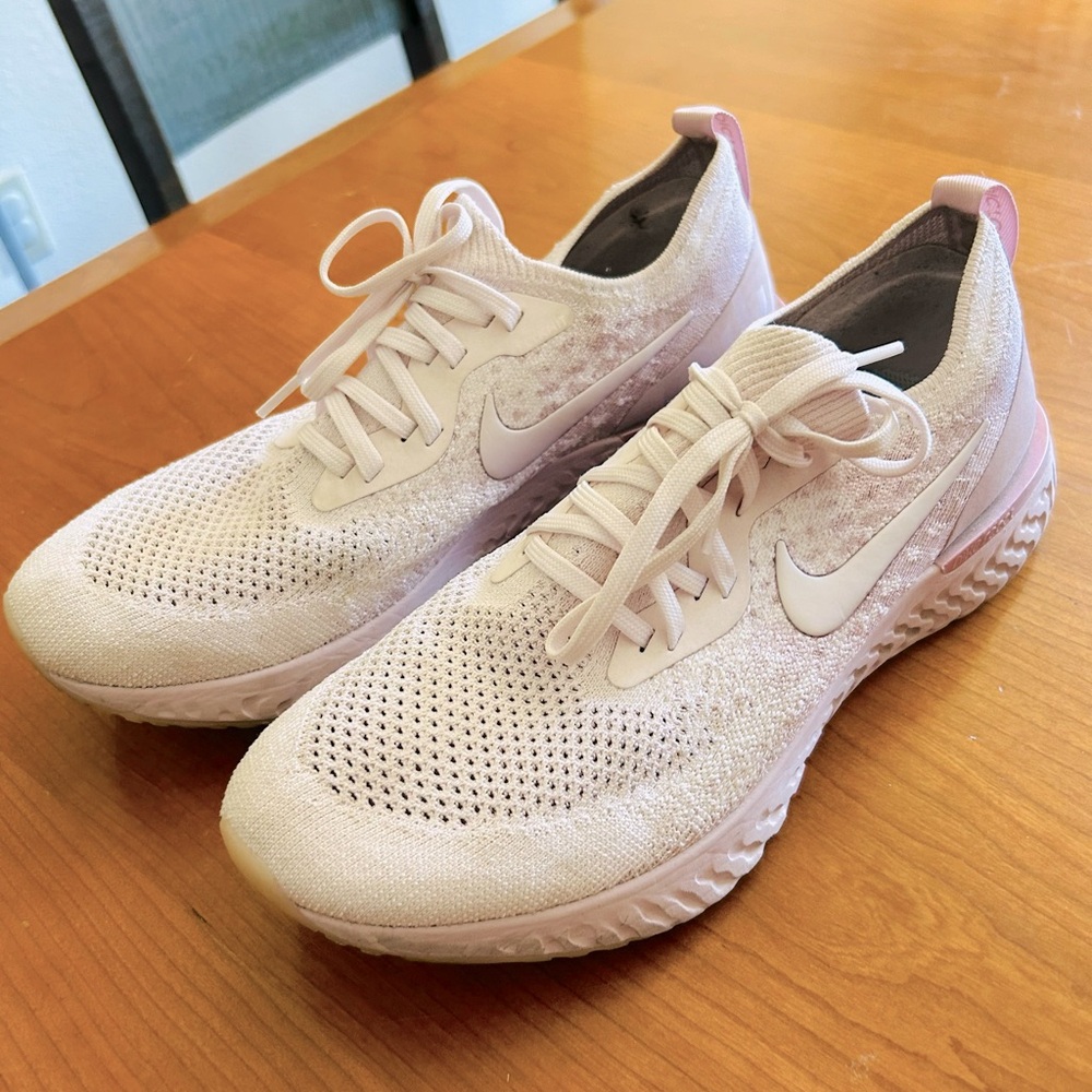Nike pink sneakers. Light wear, no damage.